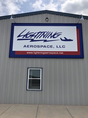 Front of Building Sign that says: Lightning Aerospace, LLC, and the website url www.lightningaerospace.net