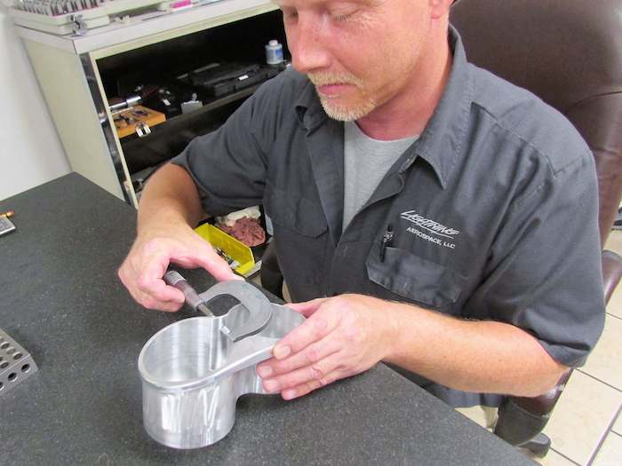 Person Measuring an Item